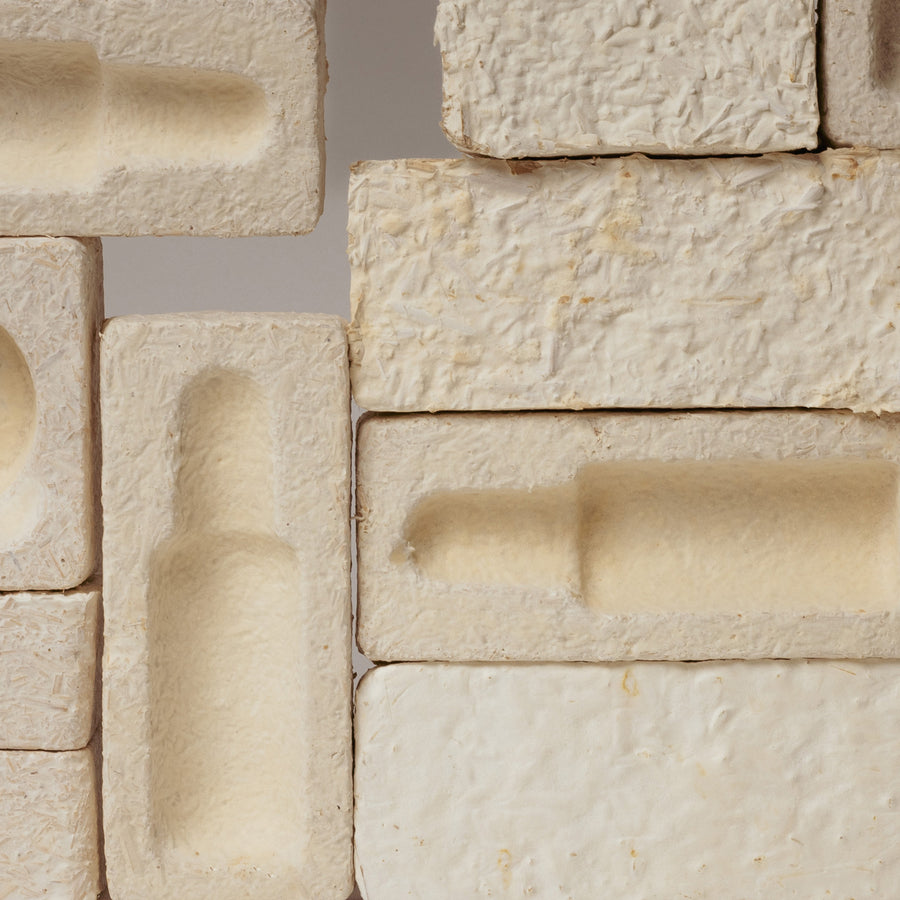 Close-up of Medshrum eco-friendly mycelium packaging, featuring textured, natural-looking materials that resemble mushrooms, highlighting innovative and sustainable design for environmentally conscious products.