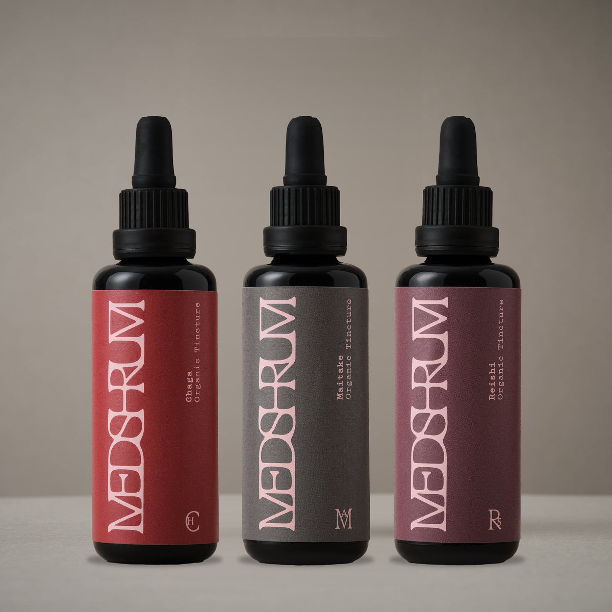 The Seasonal Resilience Edit with Medshrum Organic Chaga, Maitake and Reishi tinctures photographed on the Medshrum neutral tabletop background